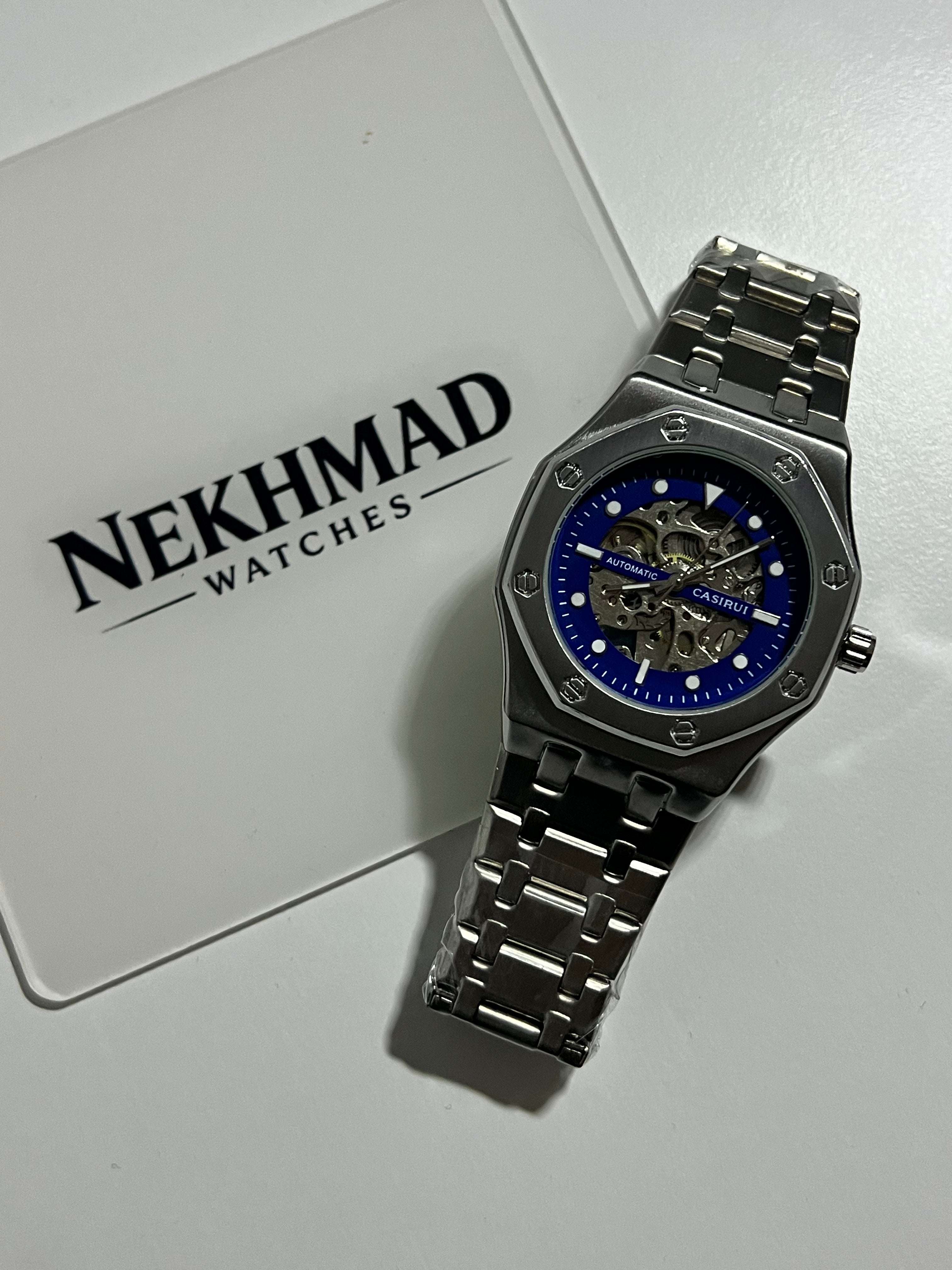 CASIRUI Mens Skeleton Watch — Blue Dial — Automatic Mechanical — Stainless Steel